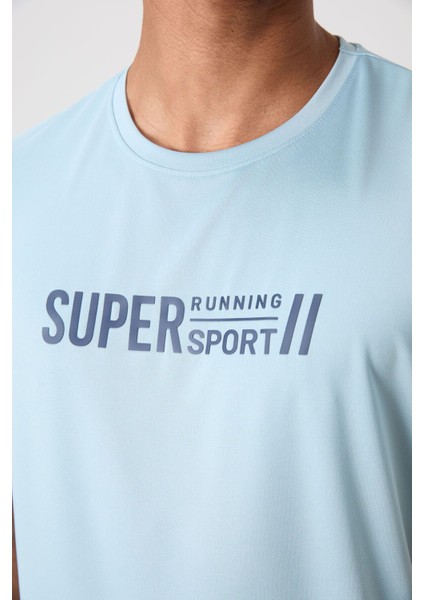 Açık Mavi Polyester Nefes Alan Dokulu İnce Esnek Standart Fit Erkek Performans T-Shirt - 88385