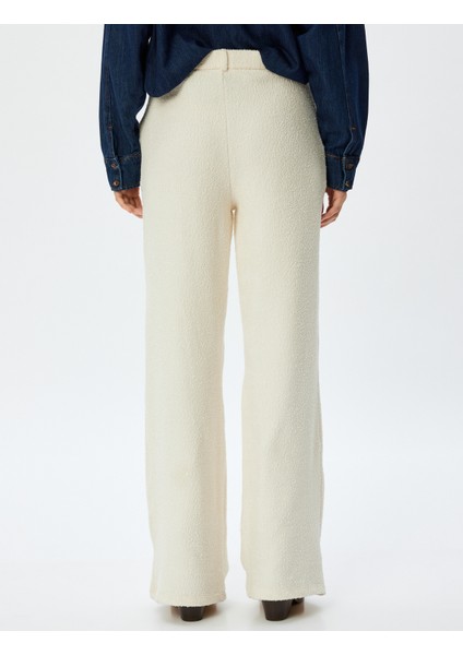 Tüvit Pantolon Bol Paça Yüksek Bel Pileli Düğmeli Cep Detaylı fırsatları