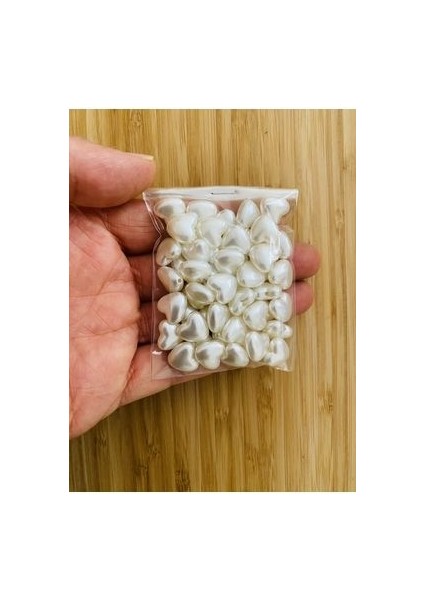 Takı Vb (Bilekli, Kolye, Halhal ve Küpe) El Işleme Barok Kalp Inci. 25GR. Tahmini 55 Adet. Krem. modelleri