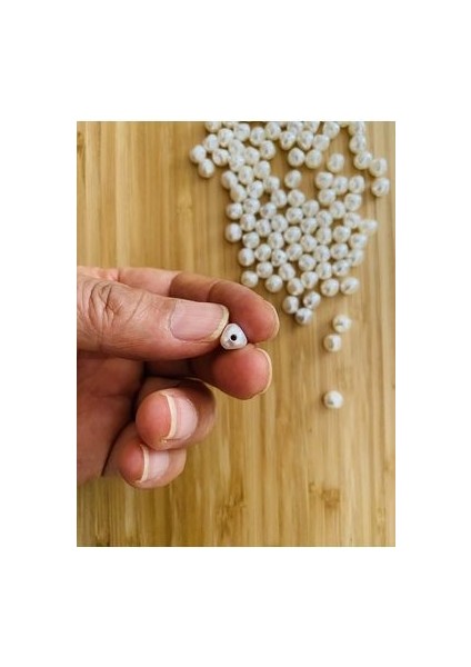 Üçgen Şekilli Barok Inci. 25GR. Tahmini 100 Adet. Krem.