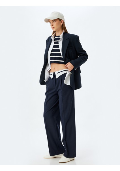 Asimetrik Ters Bel Detaylı Kumaş Pantolon Geniş Paça Cepli fiyatları