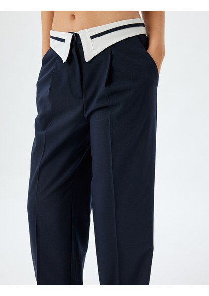 Asimetrik Ters Bel Detaylı Kumaş Pantolon Geniş Paça Cepli indirimleri