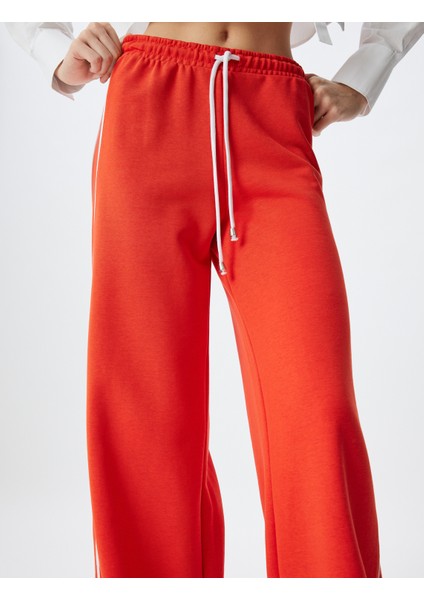 Geniş Paça Eşofman Pantolon Yanları Çizgili Üç Iplik Pamuklu indirimleri