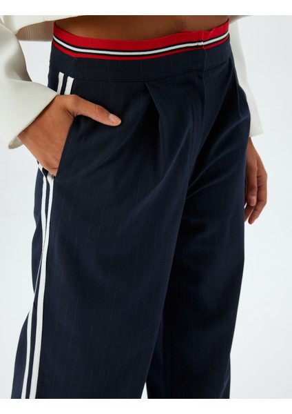 Bol Paça Kumaş Pantolon Şerit Detaylı Cepli indirimleri