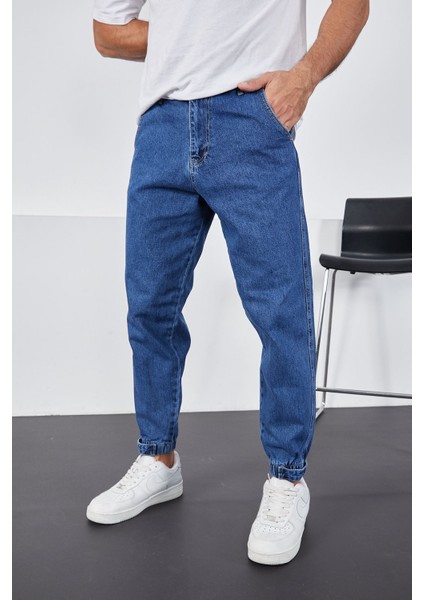 Erkek Koyu Mavi Baggy Fit Rahat Kalıp Paçası Lastikli ve Cırtlı Pantolon modelleri