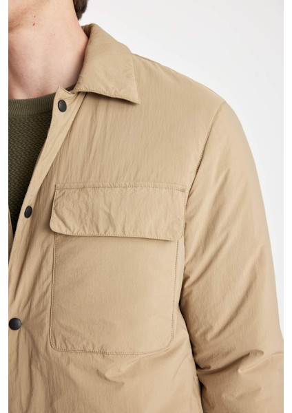 Su İtici Slim Fit Dar Kesim Gömlek Yaka Çıtçıtlı Cepli Şişme Mont D1230AX24WN indirimleri