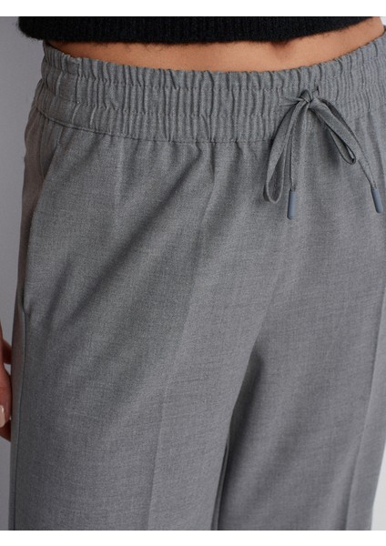 71556 Büzgü Bağlı Pantolon-Koyu Gri fırsatları