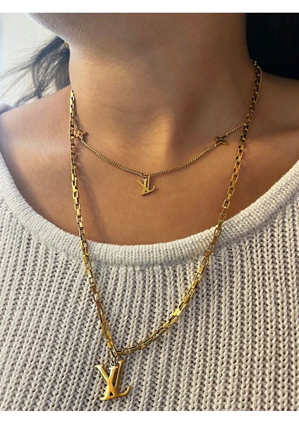 Kadın Sembol Detay Gold Renk Çelik Kolye fiyatları