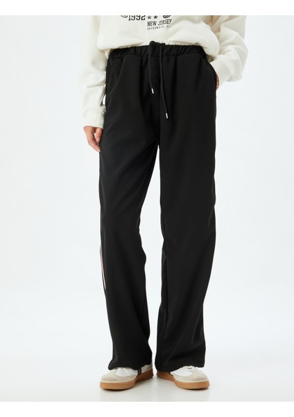 Bol Paça Pantolon Yüksek Bel Şerit Detaylı Beli Bağcıklı Krep Kumaş modelleri