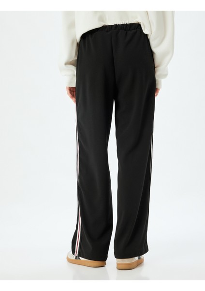 Bol Paça Pantolon Yüksek Bel Şerit Detaylı Beli Bağcıklı Krep Kumaş fırsatları