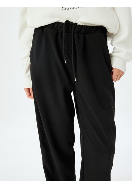 Bol Paça Pantolon Yüksek Bel Şerit Detaylı Beli Bağcıklı Krep Kumaş indirimleri