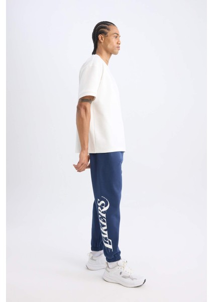 DeFactoFit Jogger Eşofman Altı NBA Los Angeles Lakers Cepli Beli Paçası Lastikli X9631AZ24AU fiyatları