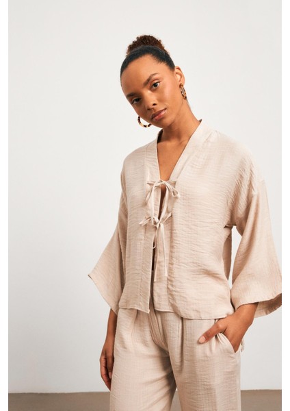 Fiyonklu Müslin Kumaş Kimono Bej Bluz modelleri