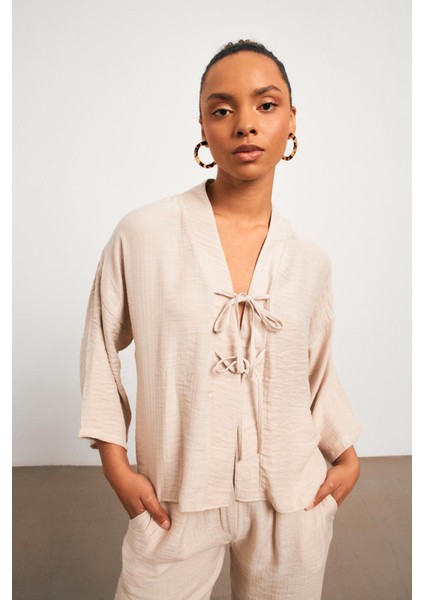 Fiyonklu Müslin Kumaş Kimono Bej Bluz fırsatları