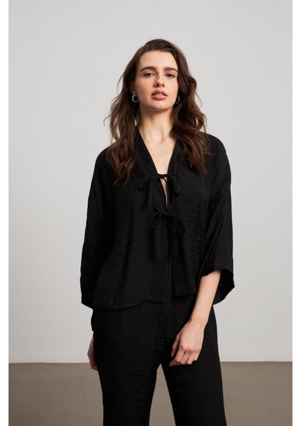 Fiyonklu Müslin Kumaş Kimono Siyah Bluz fiyatları
