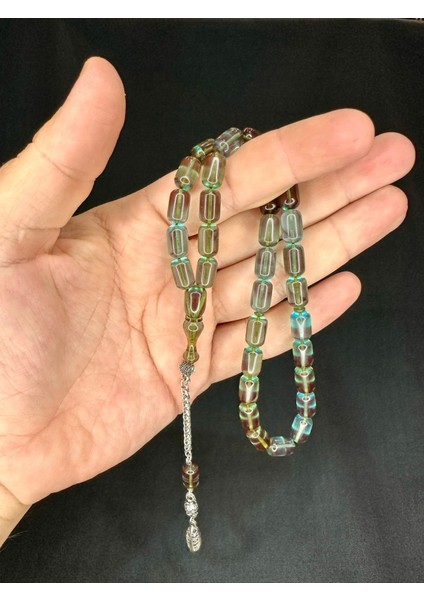 ATEŞ KEHRİBAR TESBİH KAPSÜL KESİM TURKUAZ RENK 12MM X 7MM T-534 fiyatları