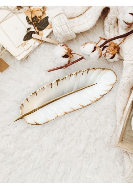 #tüytabak #dekoratiftüytabak #tüyşeklindetabak #zarifdekor #minimalistdekor #evdekorasyonu #modernaksesuar #şıktabak #sanatsaltabak,dekorative Tabak