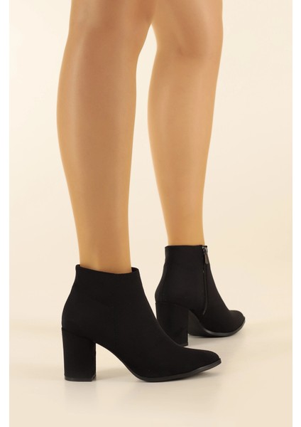 Siyah Cilt Sivri Burun 6 cm Kalın Topuklu Şık Günlük Kadın Bot TMD202473 indirimleri