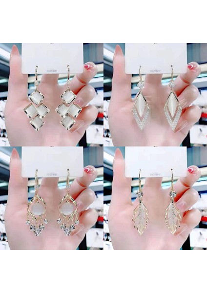 Runkaitongmoda Kedi Gözü Elmas Küpe Kadın Ilkbahar ve Yaz Ince Yeni Stil Işık Lüks High-End Küpe (Yurt Dışından) modelleri