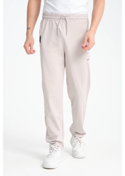 Erkek Gri Rahat Kesim Düz Paça Dalgıç Kumaş Etiket Detaylı Eşofman Altı