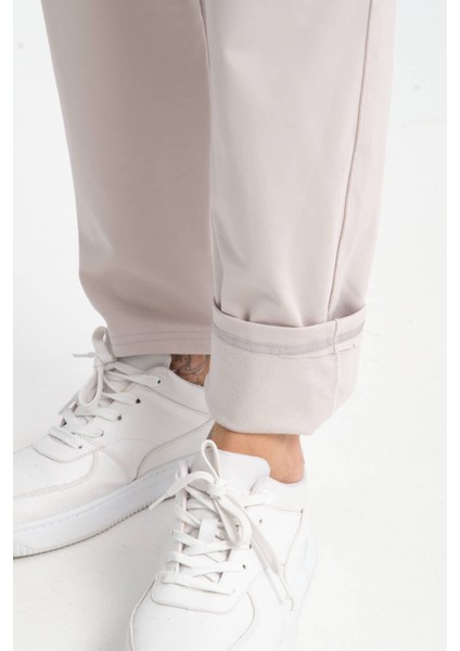 Erkek Gri Rahat Kesim Düz Paça Dalgıç Kumaş Etiket Detaylı Eşofman Altı fiyatları