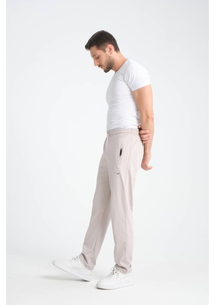 Erkek Gri Rahat Kesim Düz Paça Dalgıç Kumaş Etiket Detaylı Eşofman Altı indirimleri