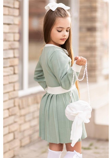 Kız Çocuk Beli Şerit ve Göğsü Fiyonk Detaylı Eteği Piliseli Yeşil Şifon Elbise fırsatları