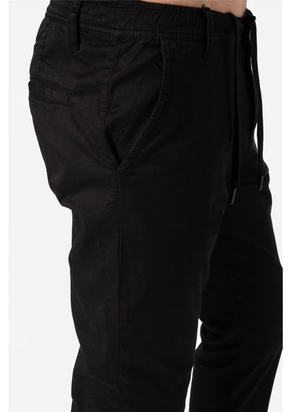 Erkek Normal Kesim Beli Lastikli ve Ipli Yan Cepli Gabardin Dokuma Pantolon Grottı Siyah B03.242.499 fırsatları