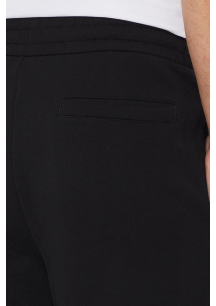 Pamuklu Logolu Regular Fit Jogger Pantolon Erkek Pantolon 50518728 001 indirimleri