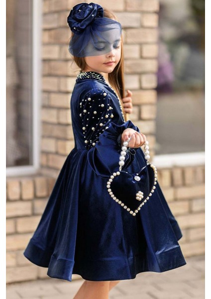 Kız Çocuk Yakadan Göğse ve Omuzları Inci Işlemeli Balon Kollu Lacivert Kadife Abiye fiyatları