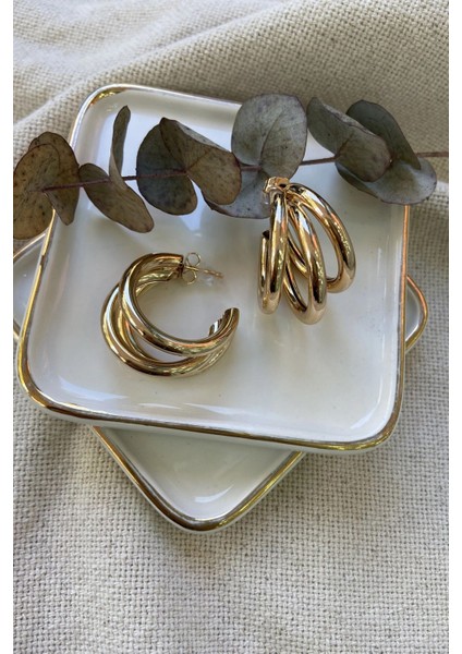 Çelik Çıkıntılı Marka Küpe