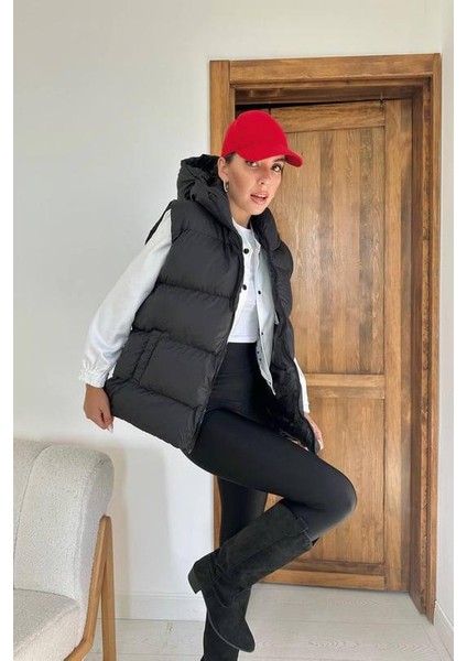 Kadın Rahat Uzun Boy Fermuar Detaylı Kapüşonlu Cepli Şişme Yelek fiyatları