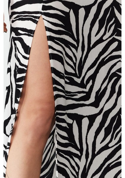 Moda Regular Düz Desen Günlük Midi Boy Yırtmaç Detaylı Dokuma Etek modelleri