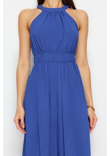 Kadın Moda Reglan Kol Boru Paça Halter Yaka Uzun Beli Büzgü Detaylı Geniş Paça Maxi Dokuma Tulum