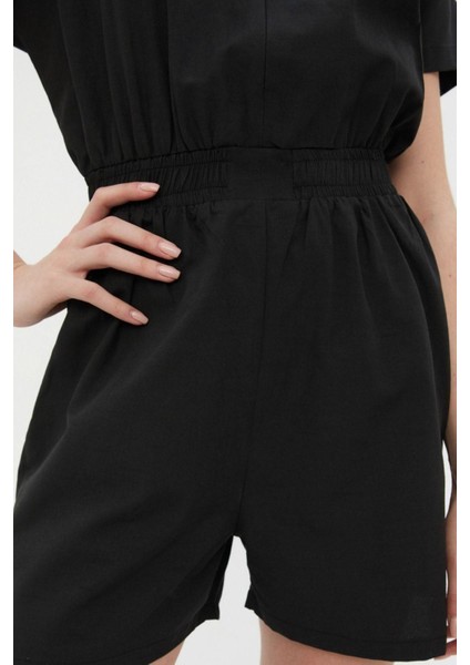 Kadın Moda Standart Kol Geniş Paça Gömlek Yaka Kısa Beli Lastikli Geniş Paça Mini Dokuma Tulum fırsatları