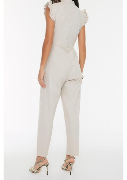 Kadın Moda Standart Kol Boru Paça Hakim Yaka Uzun Taş Fırfır ve Düğme Detaylı Uzun Dokuma Tulum indirimleri