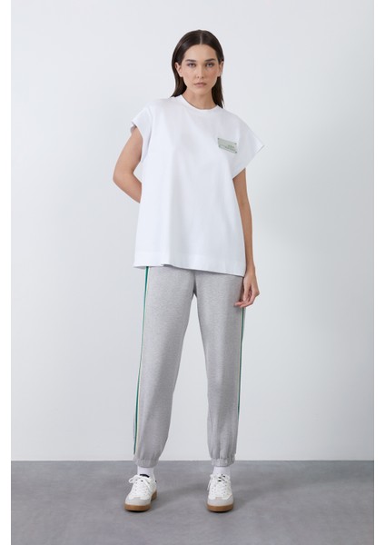 Etiket Detaylı Düşük Kol Beyaz Bluz fiyatları