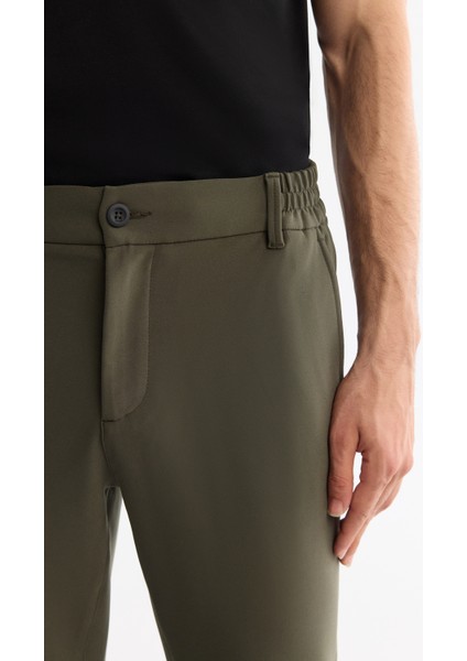 Erkek Haki Kırışmaz Hızlı Kuruyan Beli Lastikli Ekstra Esnek Teknik Kumaş Slim Fit Pantolon A42Y3065