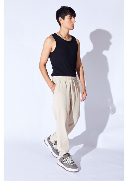 Man Edition Bej Beli Lastikli Baggy Kalıp Rahat Kesim Örme Dokulu Pantalon Jogger | EE1000619928