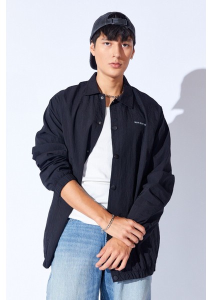 Siyah Paraşüt Kumaş Baskılı Çıtçıtlı Yağmur Geçirmez Oversize Mont | EE1000345791