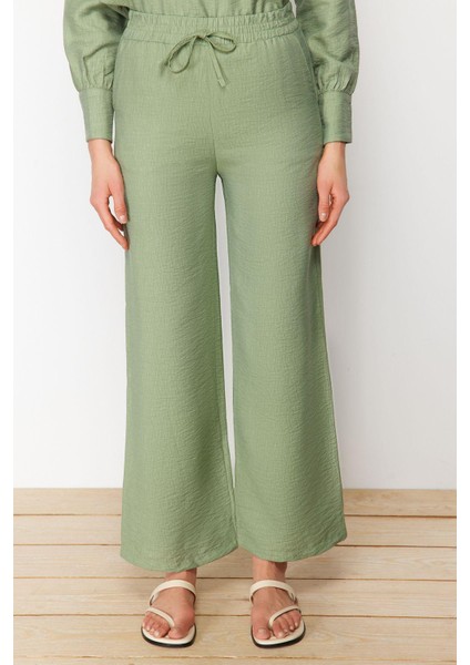 Tarz Kadın Yüksek Bel Geniş Paça Gömlek Yaka Yarım Gizli Patlı Omuz Detaylı Tunik-Pantolon Takım modelleri