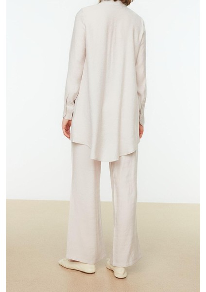 Tarz Kadın Yüksek Bel Geniş Paça Gömlek Yaka Yarım Gizli Patlı Omuz Detaylı Tunik-Pantolon Takım modelleri