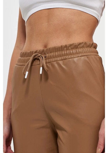 Paça ve Beli Lastikli Içi Şardonlu Bağcıklı Deri Tayt fiyatları