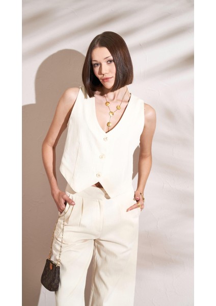 Kadın Naturel Balık Sırtı Gabardin Kumaş Önü Düğmeli Yelek fiyatları