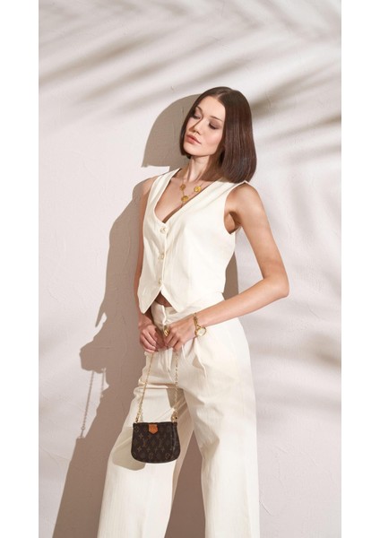 Kadın Naturel Balık Sırtı Gabardin Kumaş Önü Düğmeli Yelek fırsatları