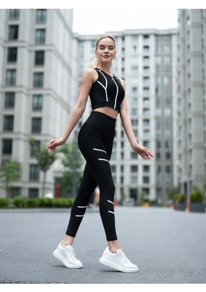 Bacakları Beyaz Biyeli Siyah Spor Tayt indirimleri