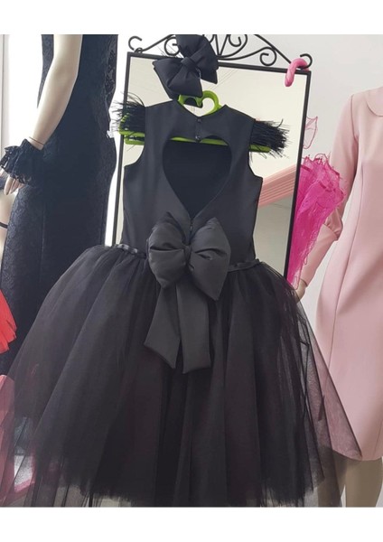 Kız Çocuk Siyah Kabarık Sırt Kalp Detaylı Kuyruklu Elbise fiyatları