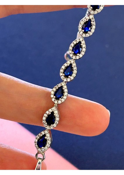 6,25 gr Silver Renk Yedi Sıra Damla Lacivert-Beyaz Zirkon Taşlı 925 Gümüş Bileklik fiyatları