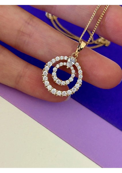 Rose Renk Çelik Zirkon Taş Işlemeli Iç Içe Halkalı Damla Taş Detaylı Kolye fiyatları
