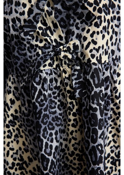 Kadın Büyük Beden Mini Boy Relaxed Fiyonklu Pamuk Leopar Desenli Dokuma Büyük Beden Elbise fırsatları